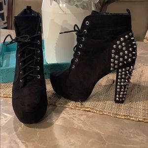 Black platform booties with spikes